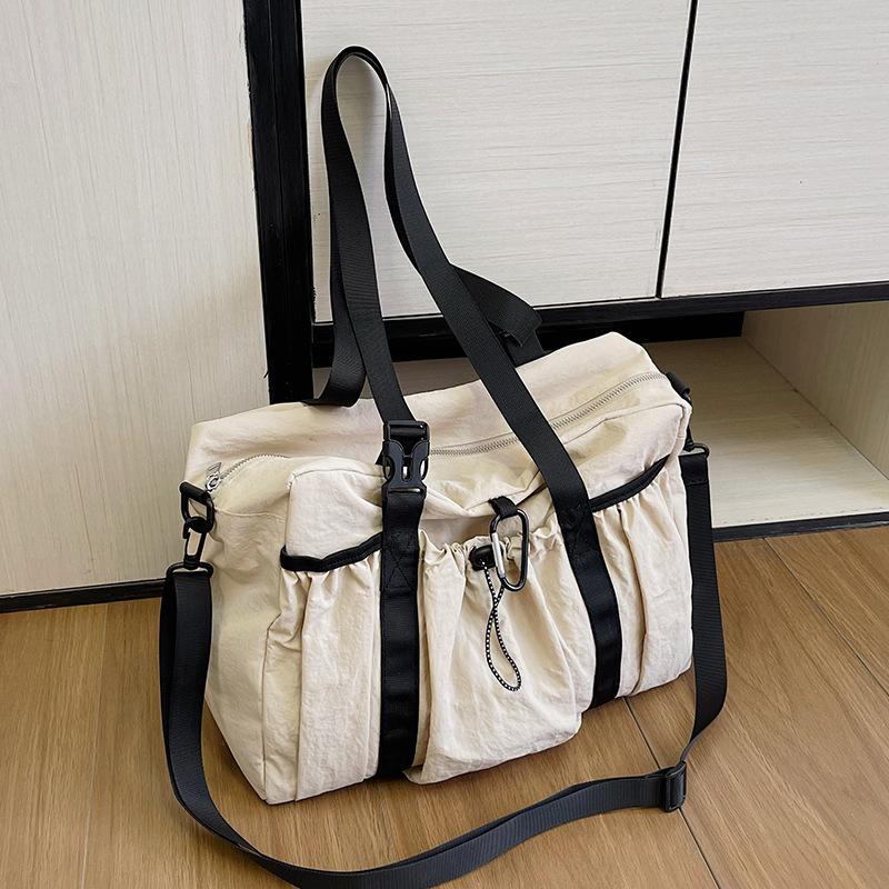 Korean version of lazy wind large-capacity travel bag leisure sports fitness bag premium niche shoulder messenger bag tote bag