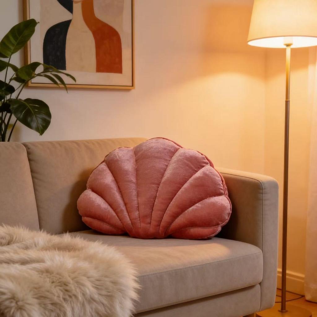 A seashell-shaped pillow, suitable for living room sofas, bedrooms, offices, and home decor.