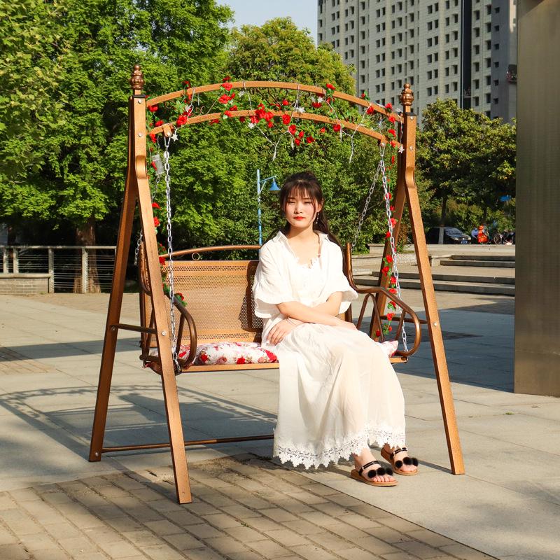 Wrought Iron Hanging Chair: Double Swing for Kids and Adults, Indoor & Outdoor Use, Ideal for Balcony or Courtyard.