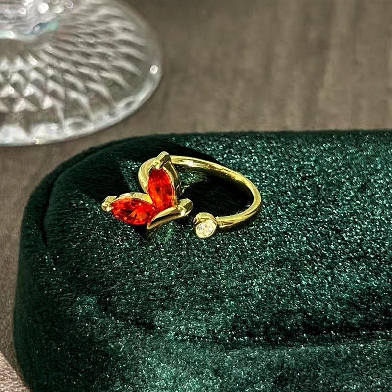 Retro court style autumn and winter new beautiful orange zircon ring women s orange light butterfly dance personalized butterfly light luxury ring