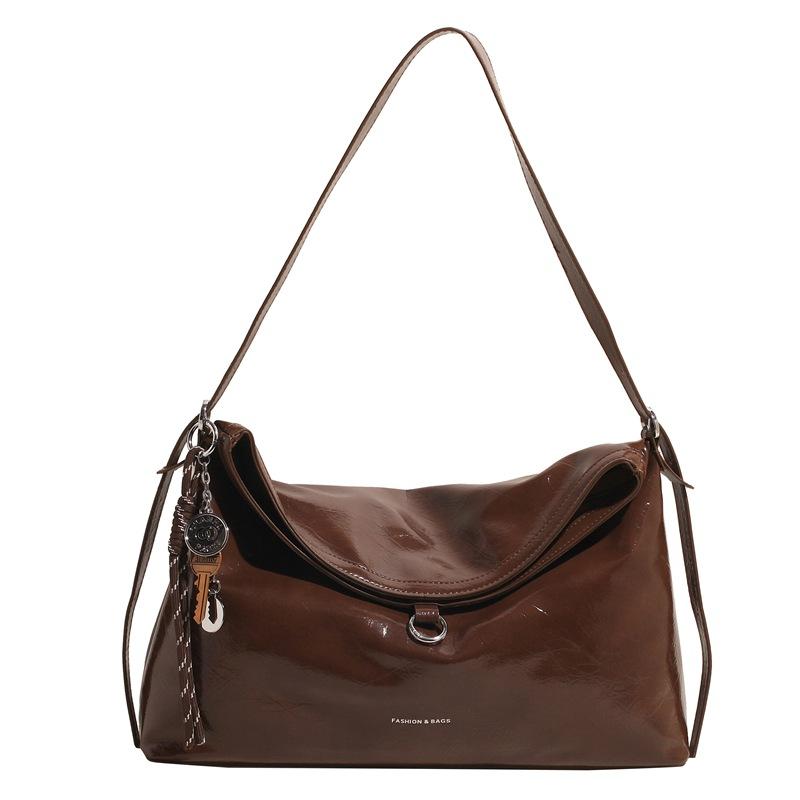 

Большая сумка Женская новая сумка на плечо Большая вместимость Сумка-тоут Сумка-мессенджер для поездок with pendant