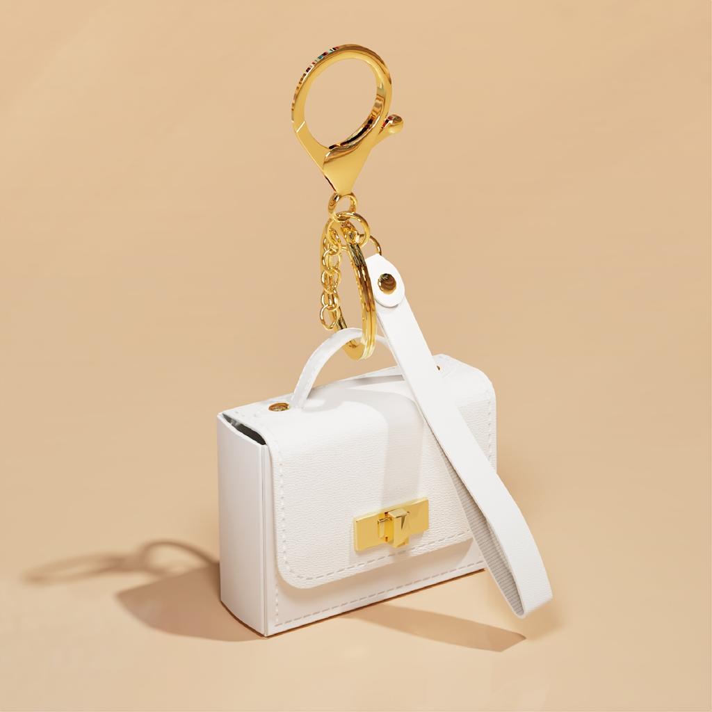 Portachiavi Mini Borsa in Ecopelle PU - Portamonete alla Moda con Dettagli Dorati, Design Compatto per Chiavi e Monete, Disponibile in Azzurro Chiaro, Rosa, Nero