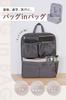 Water-repellent, lightweight, large-capacity backpack-in-bag with drink holder and multiple pockets for organization and storage. Stylish inner bag