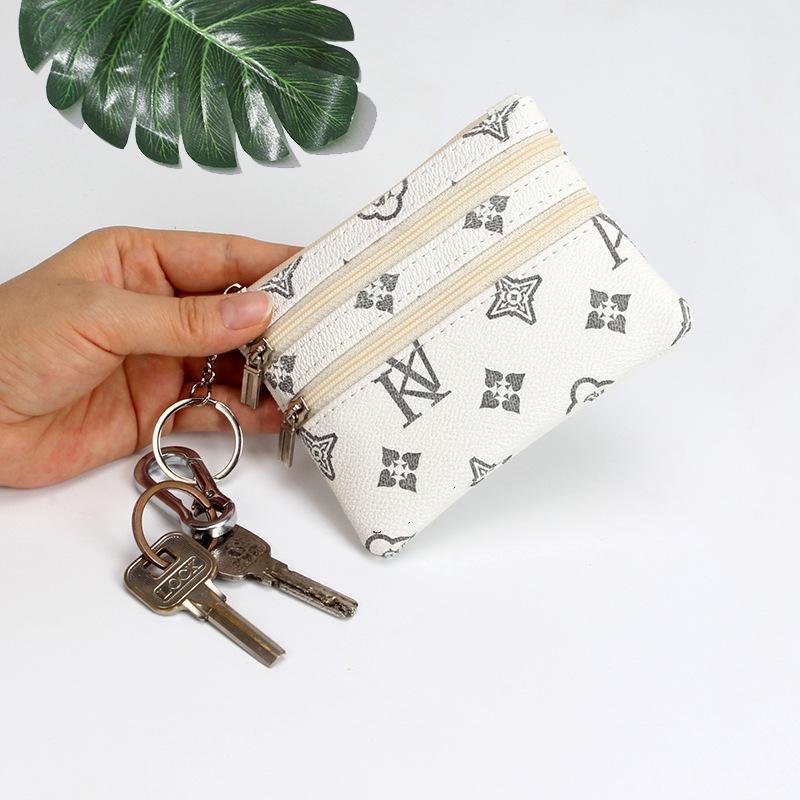 

Мини-кошелек для ручной клади и брелок для монет/карт 2023 года серый/белый