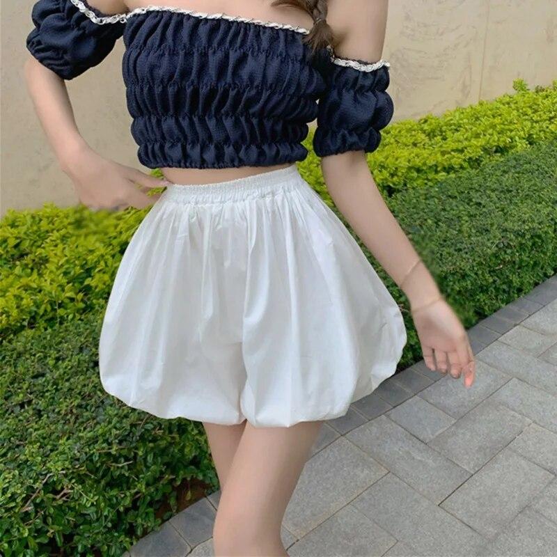 Široká noha Květinové poupata Ležérní kalhoty s elastickým pasem Zeštíhlující volné dýňové kalhoty Bloomers šortky Dámské