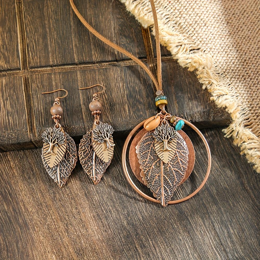 

Набор этнических женских украшений в богемном праздничном стиле, 3 предмета, цвет кофе, листья, многослойный кулон, цепочка для свитера, серьги-капли, классические украшения