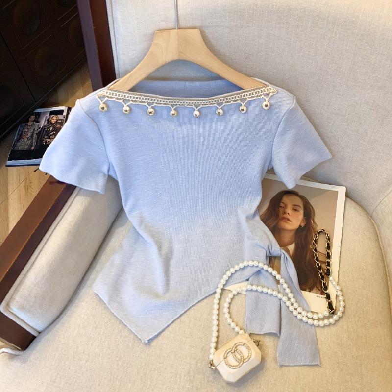 

Summer new irregular one-word diagonal neck thin short-sleeved sweater knitted sweater women one size fits all абрикосовий