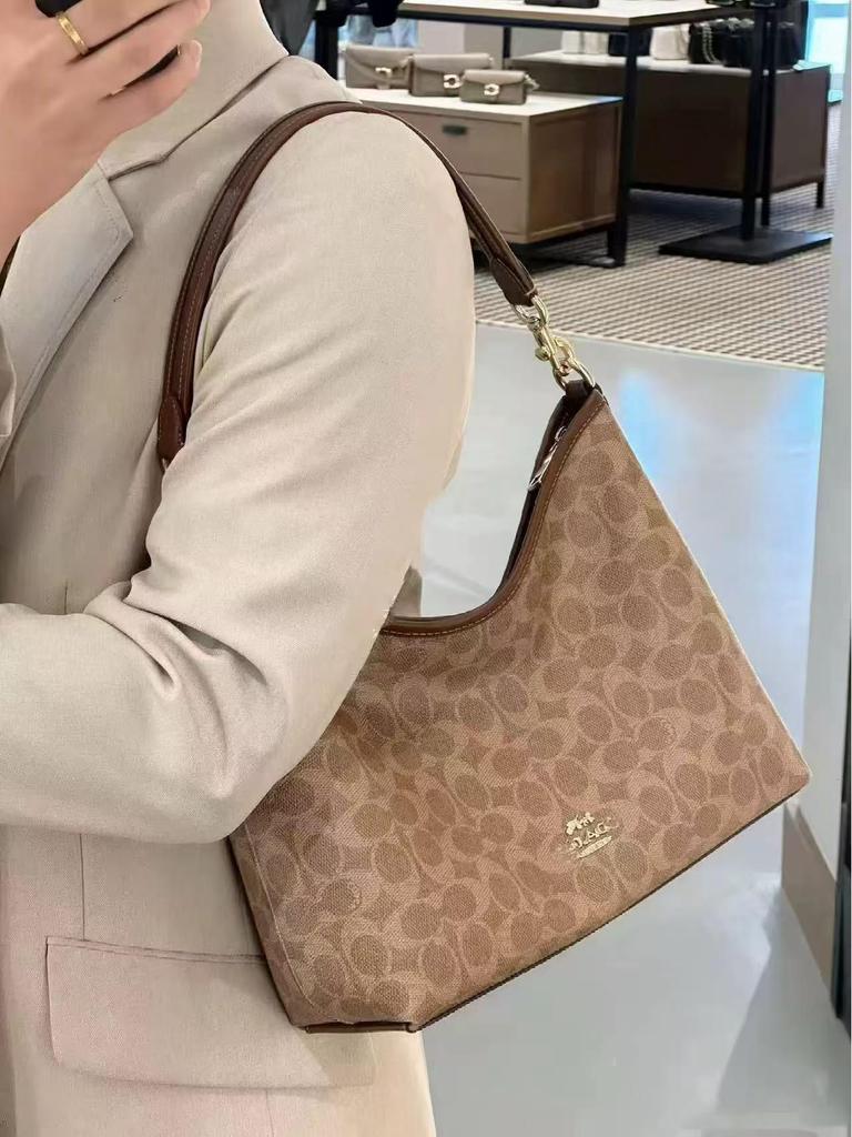 Coach Laurel Hobo Bag: Versatile, Large-Capacity Shoulder, Crossbody, and Handbag for Women.