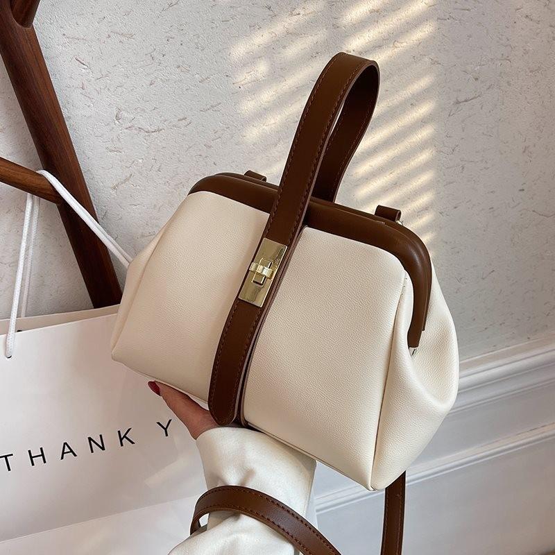 Elegant Vintage Shoulder Bag For Women Featuring Unique Saddle Shape Soft Material