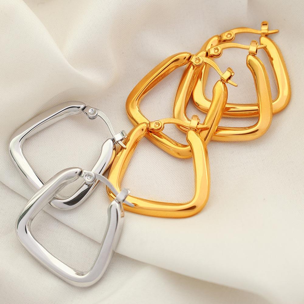 Light Luxury Personality Fashion Design High Sense Earrings Gold Plated Titanium Steel Geometric Zircon Inlaid Earrings