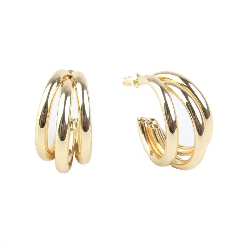Retro curved metal sense mosquito coil disc ear clips without ear holes, women's high sense niche temperament versatile circle earrings