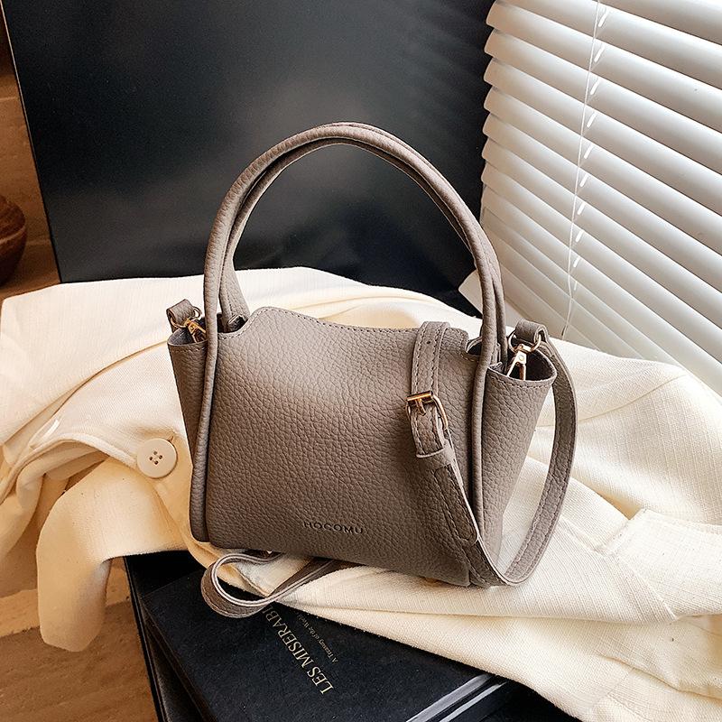 Spring women's bag niche high-end handbag 2025 new simple vegetable basket bag versatile shoulder messenger bag