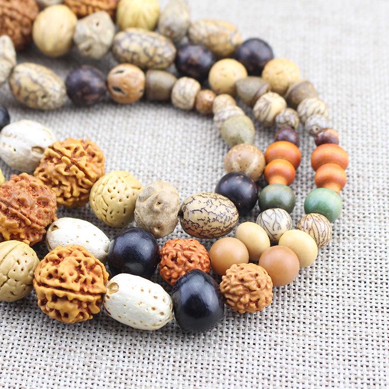 Creative Bodhi Seed Bracelet: 108 Beads for Meditation, featuring Eighteen Treasures, Star Moon, Vajra, and White Jade Bodhi.