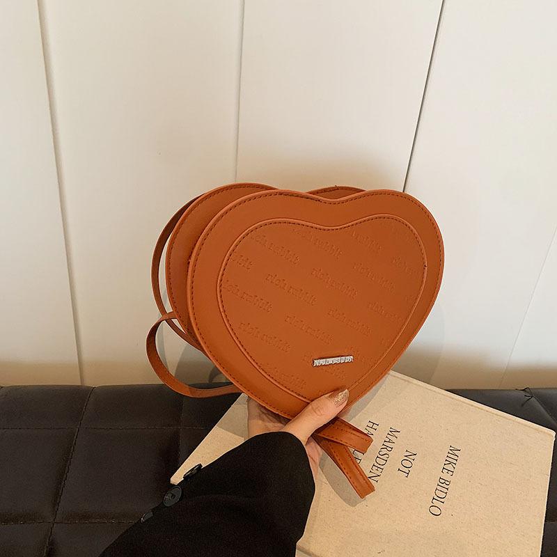 

Любовь к моде маленький свежий однотонный рюкзак интернет-знаменитости 2025 лето новый универсальный ins для выхода корейская версия женский коричневый