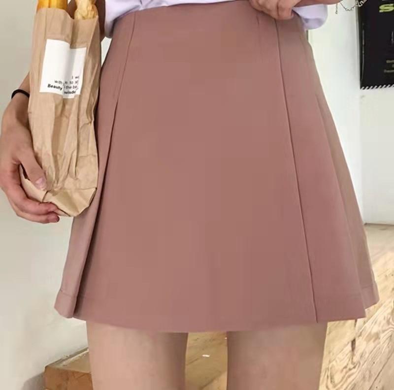 Lässiger Tanz Minirock Koreanische Damenbekleidung Süßer Uni High Waist A-Linien-Rock Eleganter Unregelmäßiger Reißverschluss Plissee-Rock 24789