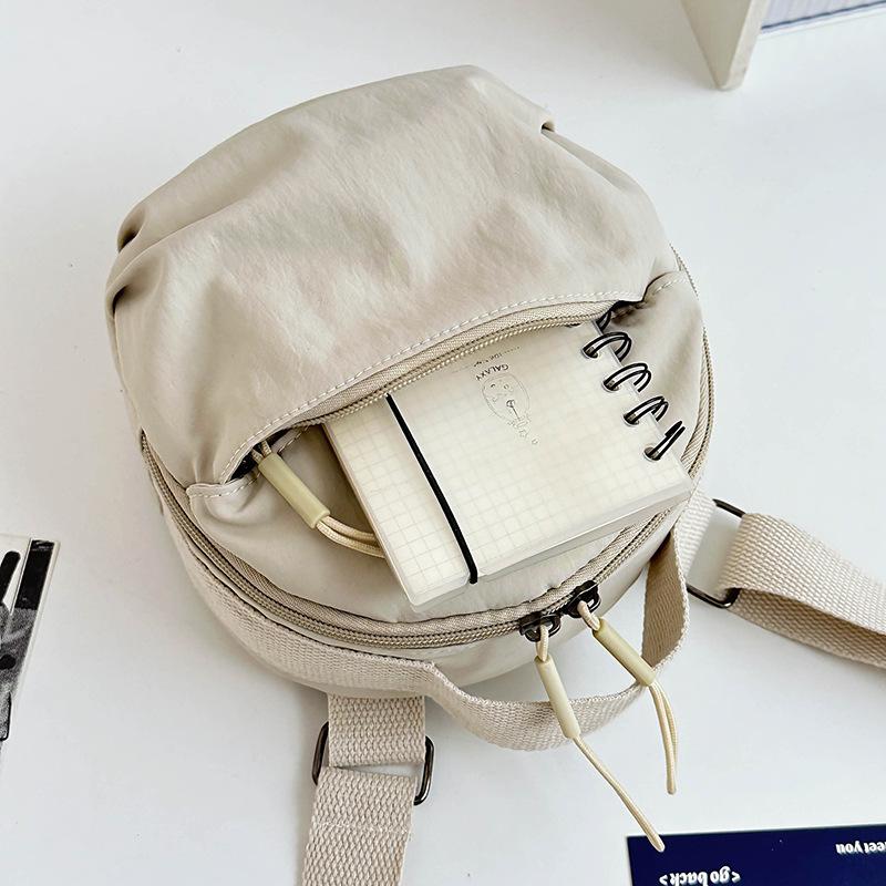 Neue kleine runde Tasche Handy-Tasche Nylon Vielseitig Einfarbig Einseitige Umhängetasche Leicht und Schlicht Kleine Umhängetasche