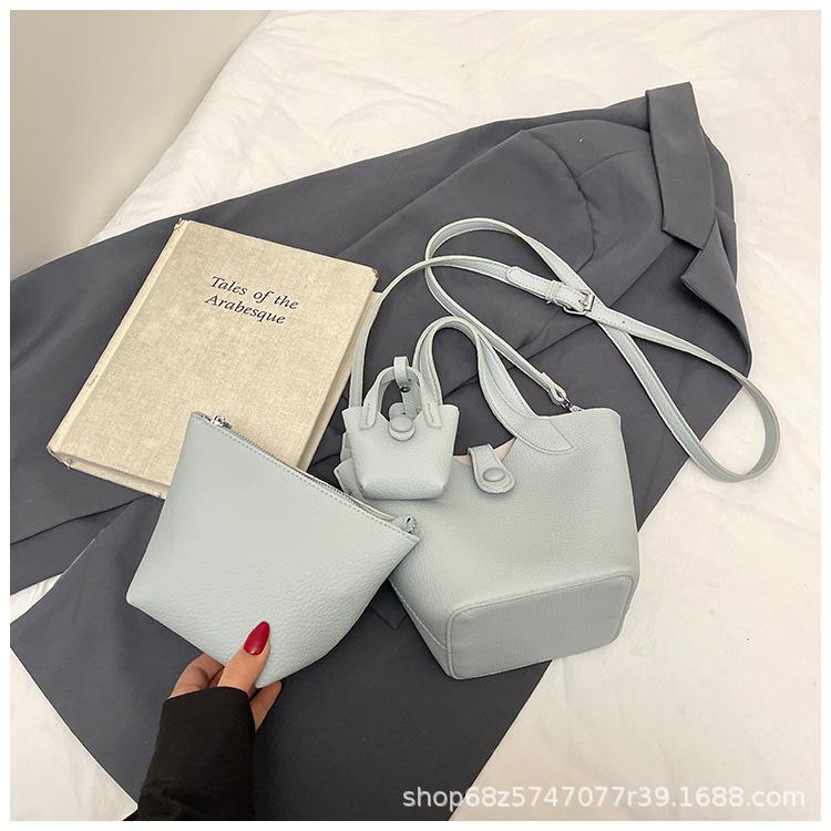 This year's popular hand-held vegetable basket bag women's 2025 spring new fashionable shoulder bag simple casual bucket bag