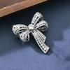 Elegant Goldplated Bowshaped Pin With Multifunctional Decor For Wedding And Occasion