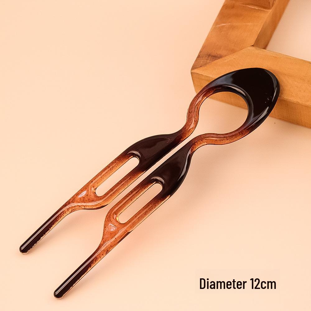 

Стильна жіноча шпилька для елегантних пучків та зачісок