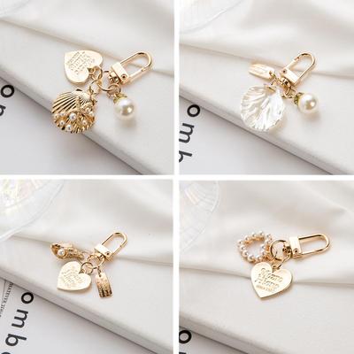 1 pz portachiavi donna ragazza moda coreana conchiglia perla portachiavi borsa ciondoli portachiavi in ​​oro portachiavi gingillo accessori chiave cuore carino