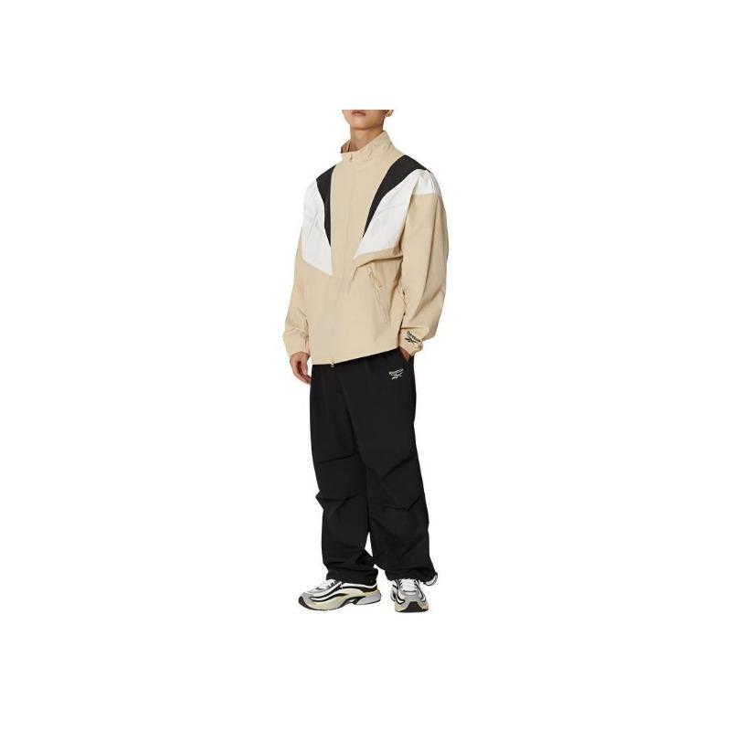 Reebok Giacca Antivento Bicolore a Blocchi con Collo Alto Twin Vector Confortevole Traspirante con Zip Intera Giacca Unisex Beige REJU4EJ39I2