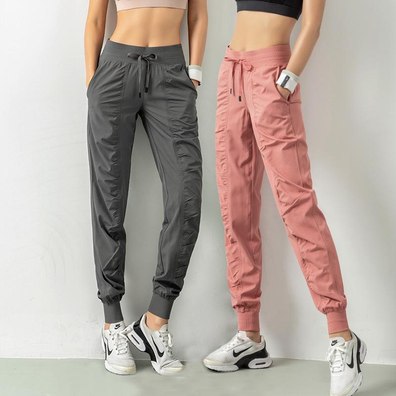 Women's Quick-Dry Yoga Fitness Nine-Point Cuffed Pants with Pockets