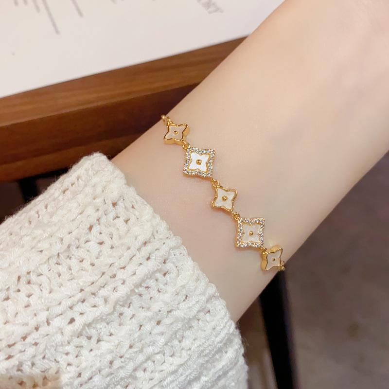 Micro-Set Zirconia Shell Temperament Adjustable Pull-Out Bracelet Female Niche Light Luxury Design Sense Four-Leaf Clover Bracelet Hand Jewellery