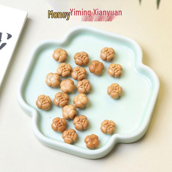 

Yi Ming Xian Yuan Sandalwood Carved Fu Character Ornaments: Copper Coin, Axe, Peanut, Radish, and Mushroom.
