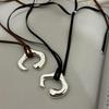 New Korean Brown Leather Cord Necklace with Abstract Human Body Silver Pendant - Light Luxury Clavicle Chain