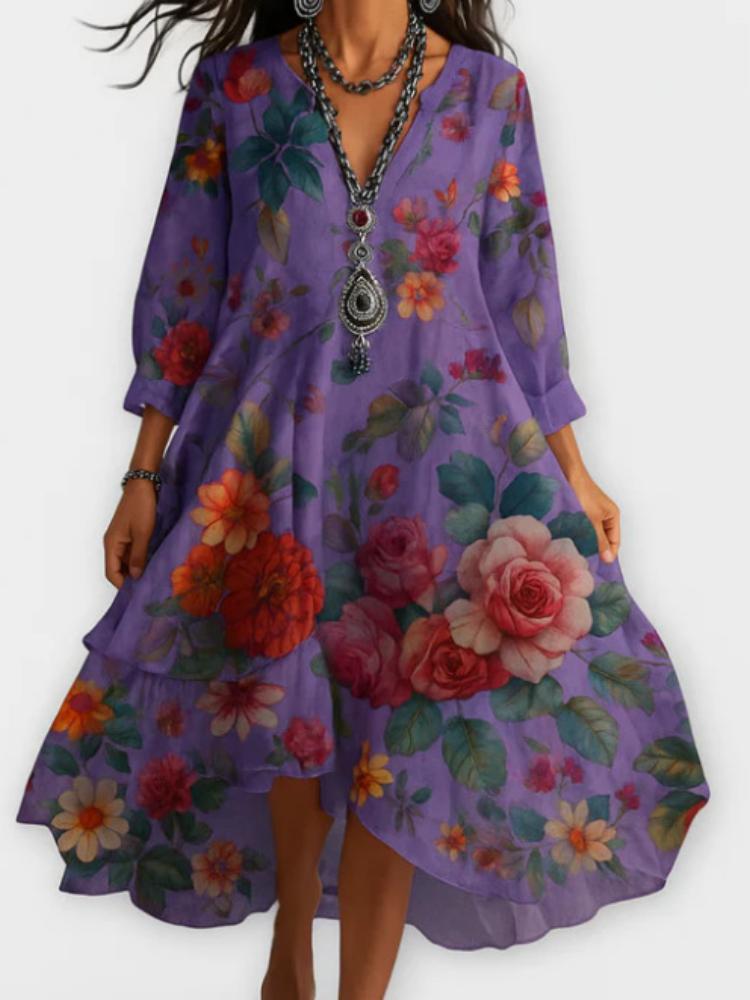 Midi-kjole med V-hals og blomsterprint, asymmetrisk fald, kort erme, flere farger