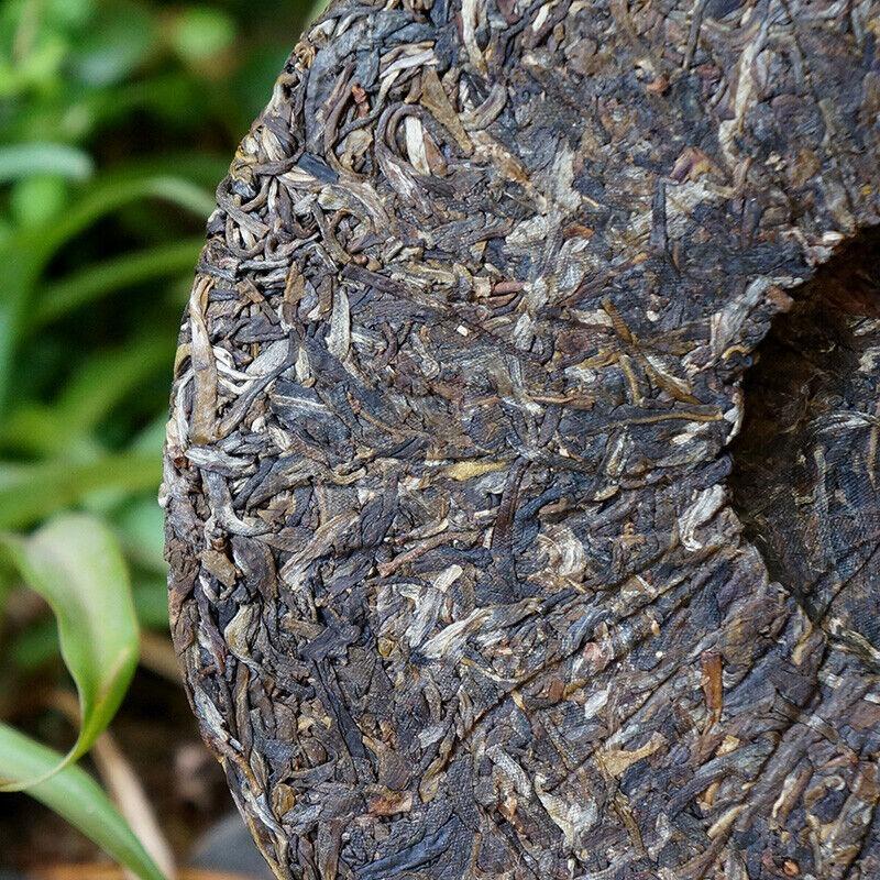 Jiujiu Xiaotai Xiaguan Tuocha Tchaj-wan č. 6 Pu'er Qizi koláč Pu-erh čaj Surový 357g