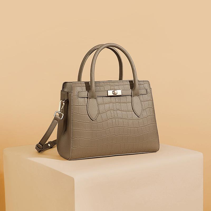 Bag women s new leather portable messenger women s bag large-capacity cowhide atmospheric middle-aged mother bag