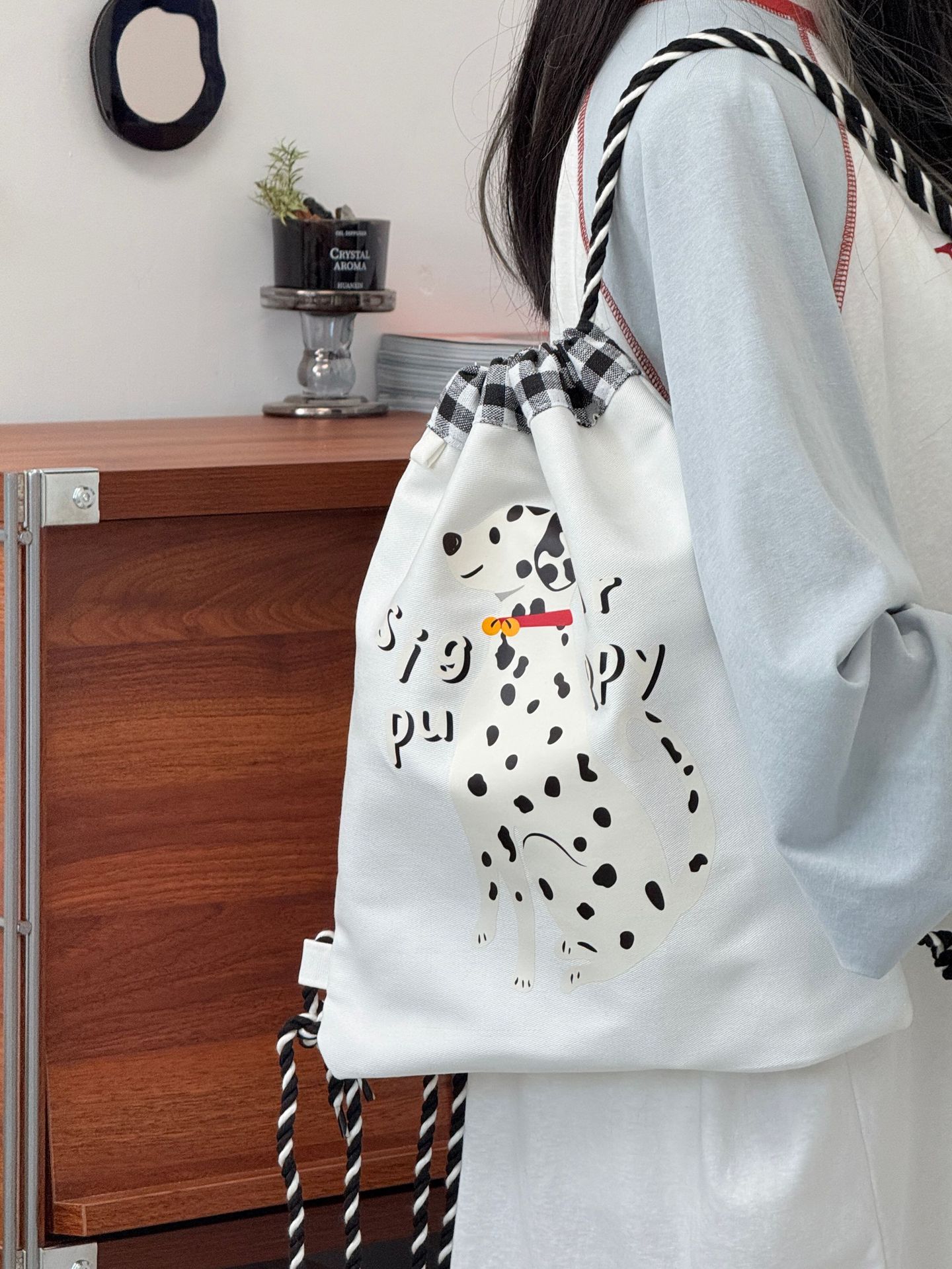 Cute spotted dog print drawstring drawstring backpack with high appearance, 2026 summer new casual versatile student backpack