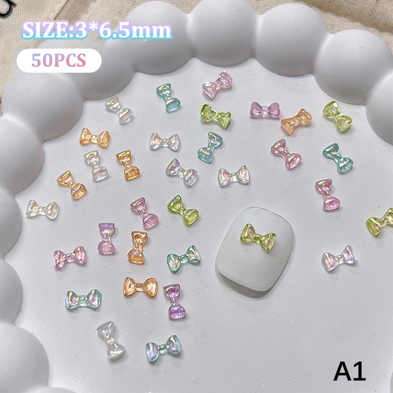 

50Pcs Manicures Decoration Charm Colorful Bow Nail Art Accessory Illusionary AB Color Resin Ribbon Bows