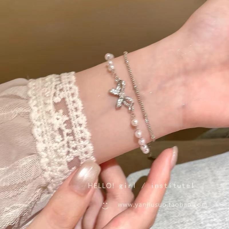 Double bow pearl stacked bracelet light luxury niche exquisite bracelet accessories student high value jewelry gift серебряный