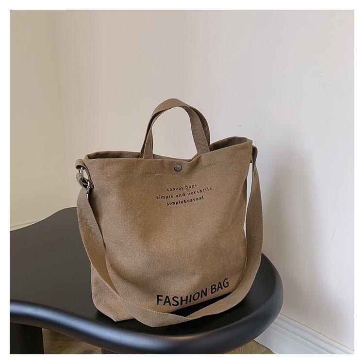 

Женская холщовая сумка-тоут кроссбоди 2023: Просторный ретро-дизайн для студентов и поездок на работу коричневый