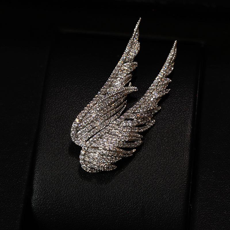 

Трендовые сверкающие броши в виде крыльев ангела со стразами для женщин и мужчин, для костюма, платья, элегантные броши-булавки с перьями, офисная вечеринка, ювелирные подарки серебряный