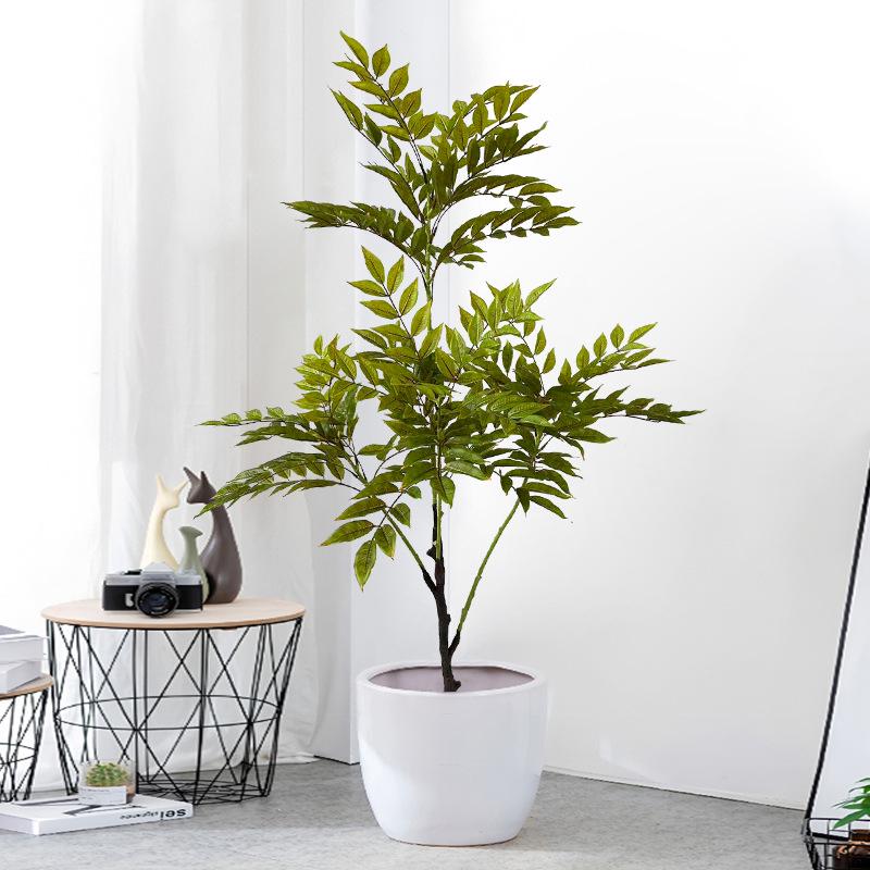High-End Faux Potted Plant with Green Painted Wooden Leaves for Home and Courtyard Décor.