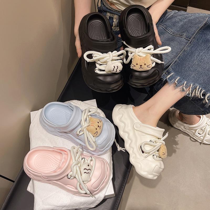 Niche Design Hole Shoes for Women In 2025 New Summer Wear Thick Soles To Increase the Height of Two Women Wearing Bag Head Cool Slippers