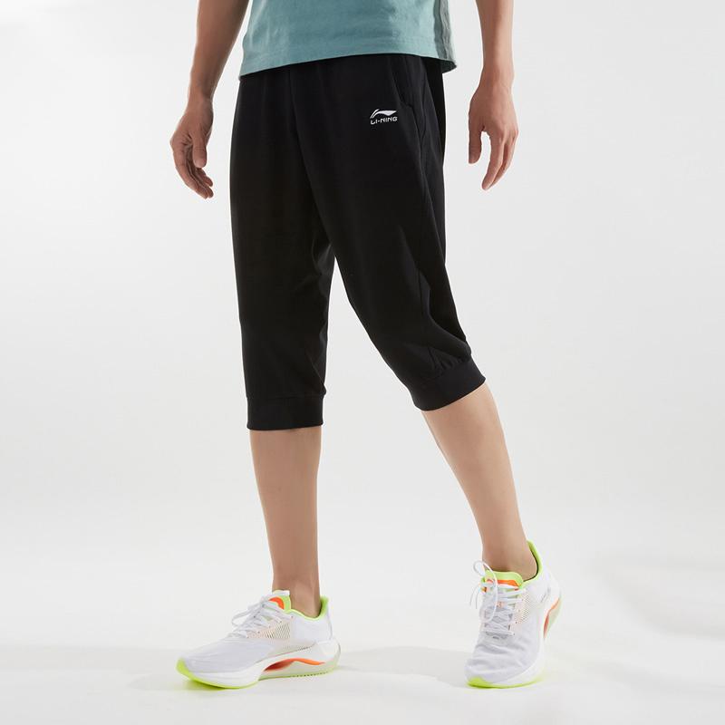 Li Ning Sports Lifestyle Series Solid Color Mid Waist Comfortable Versatile Breathable Tapered Three Quarter Knitted Sports Pants AKQU431-1