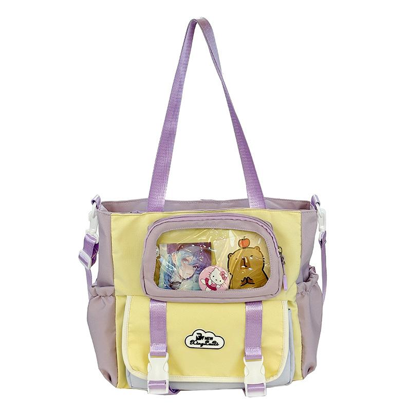 Large capacity messenger bag female college student class leisure commuter bag make-up bag cute contrasting color portable shoulder bag