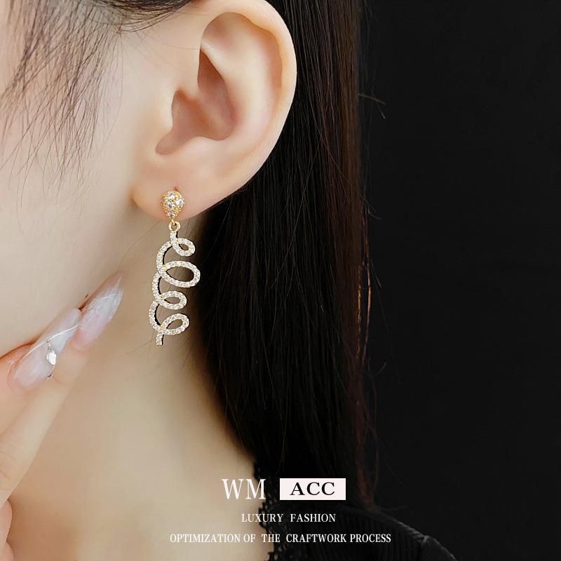Silver Needle Zircon Water Drop Earrings - Light Luxury, Exquisite, Cold Style, High-End Fashion Statement.