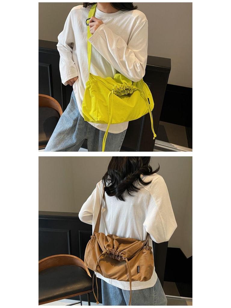 2025 Black Pleated Drawstring Tote - Large Capacity, Versatile Single-Shoulder Crossbody Bag for Casual and Commute Use.