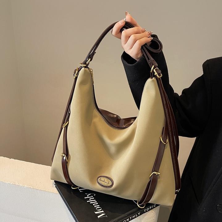 Herbst und Winter Beliebter Retro Wildleder Rucksack Damen Neuer College-Stil Pendlertasche Trendige Tragetasche mit großer Kapazität