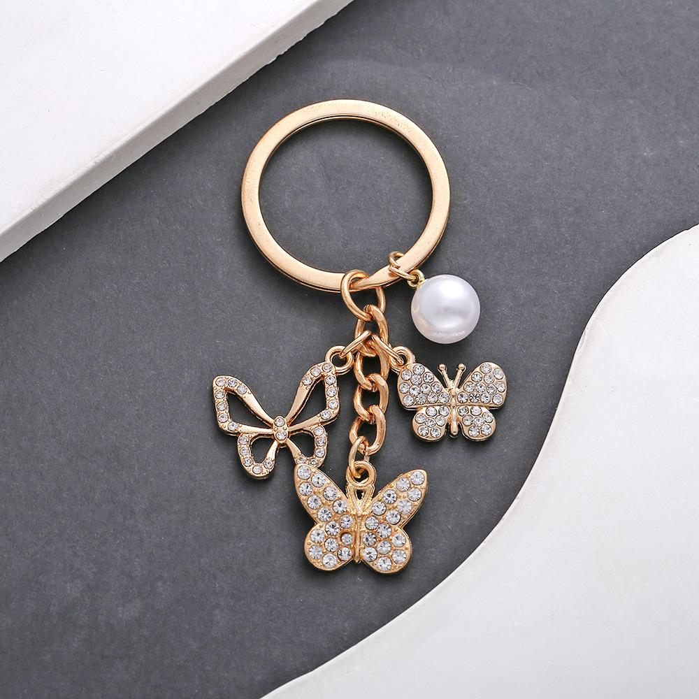 

Hollow Butterfly Rhinestone Pearl Keychain Jewelry Pendant