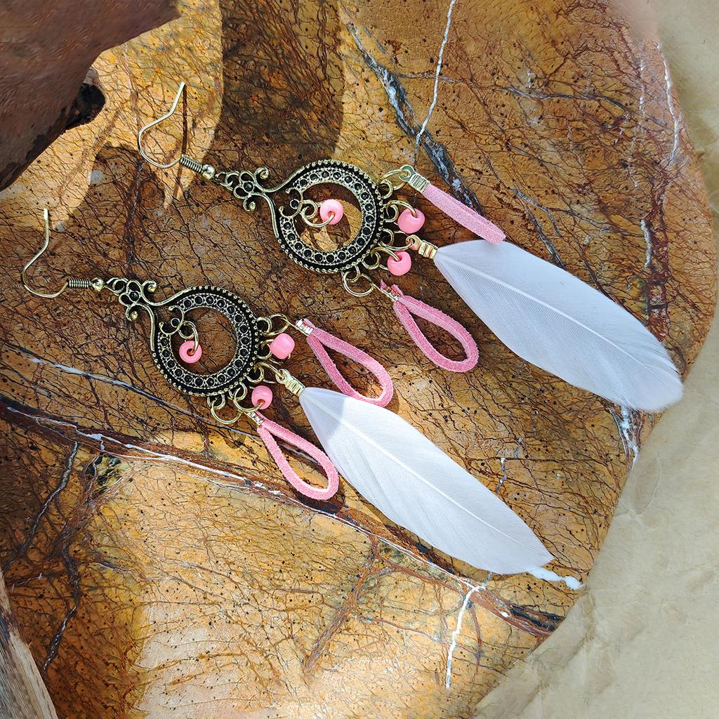 Retro ethnic style woven feathers long fringed earrings, bohemian high-end hollow rice bead earrings
