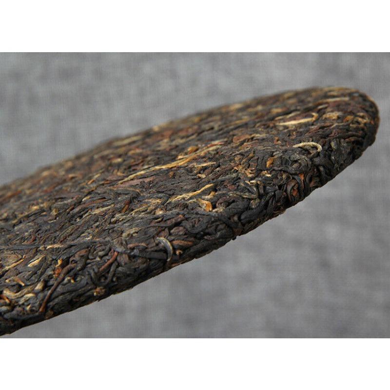 Gu Shu Hong Cha Sonnengetrockneter alter Baum Dianhong Dian Hong Schwarzteekuchen 357g