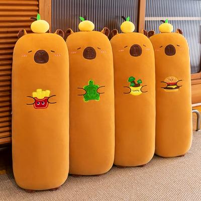 Mīksts burgers, frī kartupeļi, kapibaras plīša rotaļlietas meitenēm, garie spilveni gulēšanai zīdaiņiem, sānu gulēšanas spilveni dīvānam, jostas spilveni
