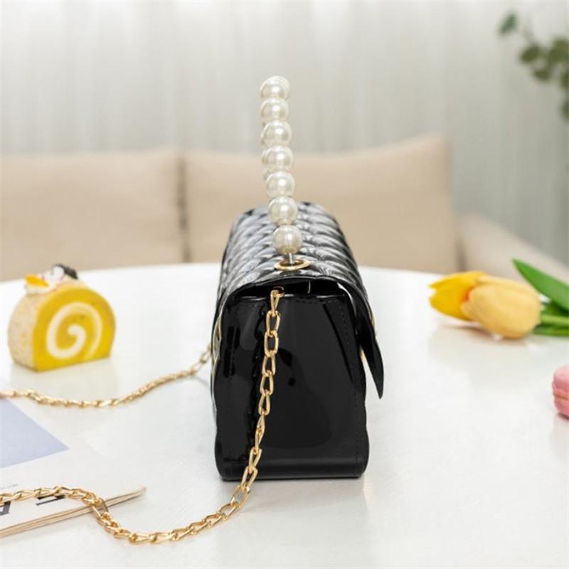 Modische Silikon-Handytasche Jelly Pearl Handtasche Stilvolle Kette Umhängetasche Geeignet für Frauen Täglich, Arbeit, Outdoor, Reisen.