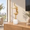 Inverted Pose Human Sculpture Metal Finish with White Pedestal
